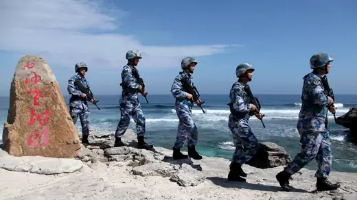 Chinese naval personnel patrol Woody Island in 2016.
