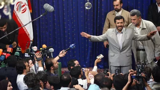 Iranian President Mahmoud Ahmadinejad speaks to a crowd of reporters