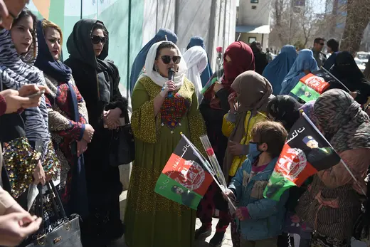 Afghan civil activists gathering along a road during International Women’s Day in Kabul, Afghanistan, on March 8, 2020. 