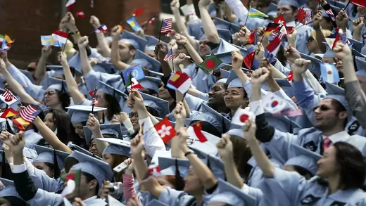 Students cheer during commencment ceremonies at Columbia University May 18, 2005 in New York City. This is the 251st class to graduate from Columbia.