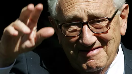 Henry A. Kissinger waves 
