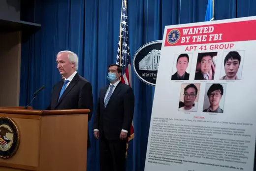 Deputy Attorney General Jeffery A Rosen speaks during a Justice Department's news conference to announce charges in China-related intrusion campaigns.