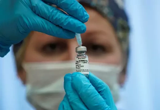 A nurse prepares Russia's "Sputnik-V" vaccine against the coronavirus disease (COVID-19) for inoculation in a post-registration trials stage at a clinic in Moscow, Russia.