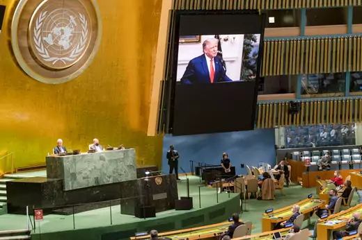 U.S. President Donald J. Trump is projected on a screen in the mostly vacant UN General Assembly in New York during the 75th annual UN General Assembly, which is being held mostly virtually, on September 22, 2020. 