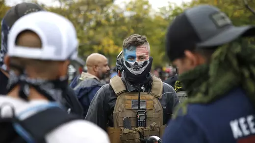 A member of the far-right Proud Boys stands at a demonstration in Portland.