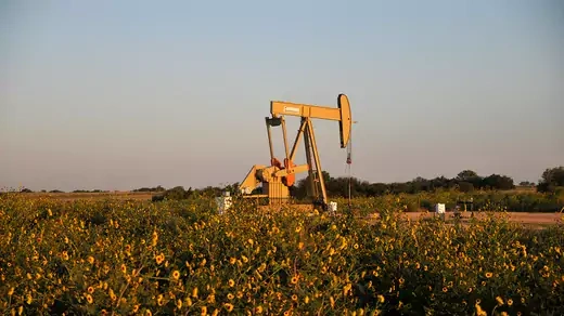 A pump jack operates at a well site leased by Devon Energy Production Company near Guthrie, Oklahoma.