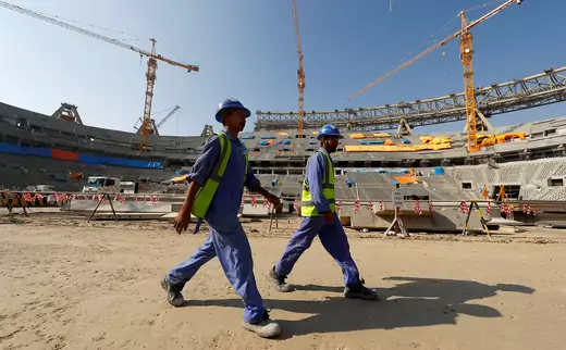 Workers are seen in the Lusail National Stadium, which is under construction for the 2022 FIFA World Cup in Doha, Qatar.