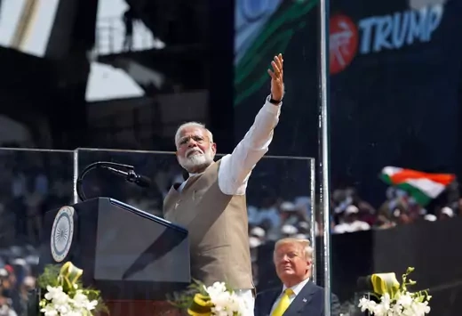 U.S. President Donald Trump observes as Indian Prime Minister Narendra Modi speaks during the "Namaste Trump" event at Sardar Patel Gujarat Stadium, in Ahmedabad, India, on February 24, 2020.