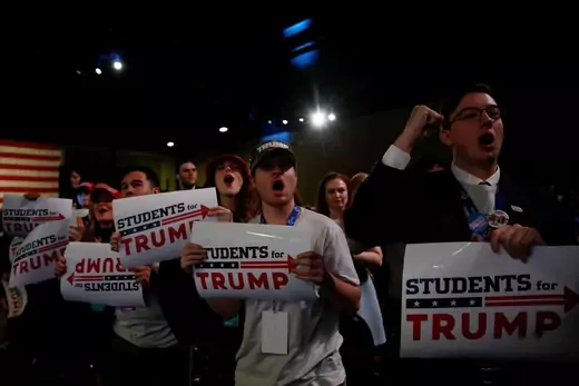 Supporters cheer as U.S. President Donald Trump delivers remarks at the Turning Point USA Student Action Summit.