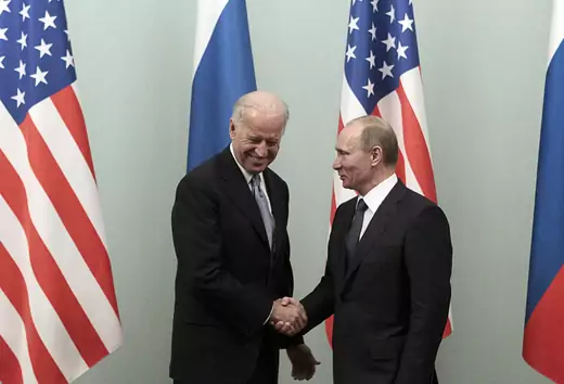 Russian Prime Minister Vladimir Putin (R) shakes hands with U.S. Vice President Joe Biden during their meeting in Moscow March 10, 2011.