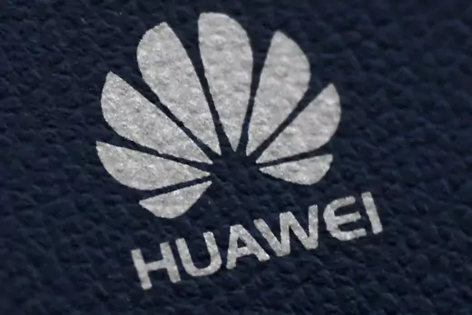 The Huawei logo is seen on a communications device.