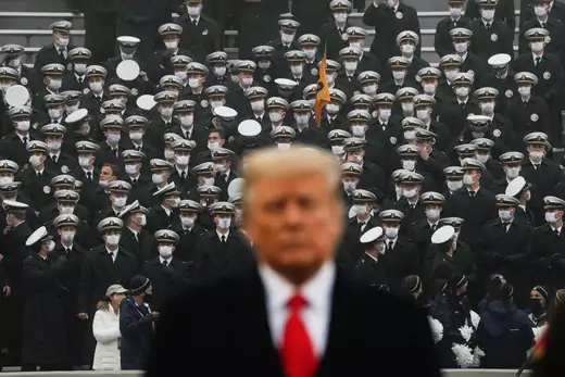 U.S. President Trump stands onto the field at Michie Stadium ahead of the annual Army-Navy collegiate football game.