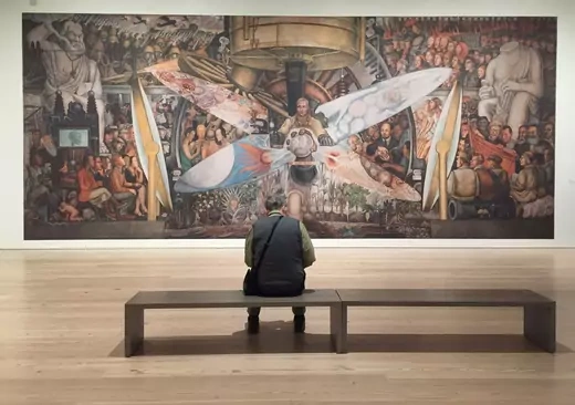 People look at art at the press preview of "Vida Americana: Mexican muralists remake American art, 1925-1945", that brings together 200 works by 60 American and Mexican artists at the Whitney Museum, in New York on Febuary 11, 2020.