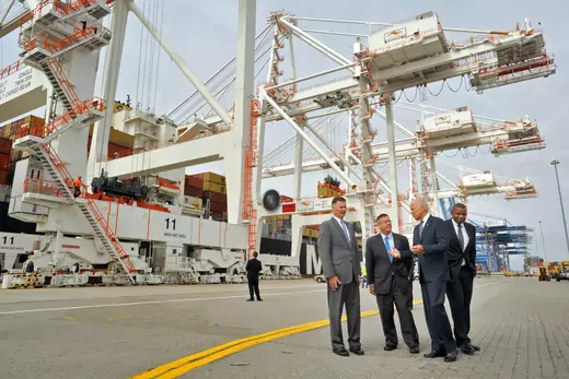 Vice President Joe Biden, right, visits the Port of Baltimore Monday morning, September 9, 2013, with Transportation Secretary Anthony Foxx, left, where they were shown the new Panamax cranes by Maryland Port Administration Executive Director, Jim White, second from left, and Ports America Chesapeake president, Mark Montgomery, third from left.