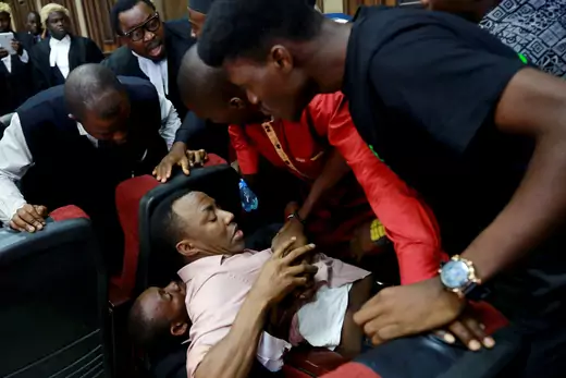 A melee takes place in a Nigerian courtroom in response to the re-arrest of journalist and human rights activist Omoyele Sowore.