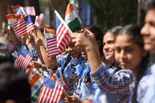 Students of Sarvodaya Co-Educational Senior Secondary School waving flags during a visit by First Lady of the United States Melania Trump to a Delhi Government School, at Moti Bagh on February 25, 2020 in New Delhi, India.