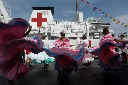 Members of the Chinese People Liberation Army Navy stand at the China's People's Liberation Army (PLA) Navy hospital ship Peace Ark, during its arrival ceremony at the port in Venezuela on September 22, 2018.