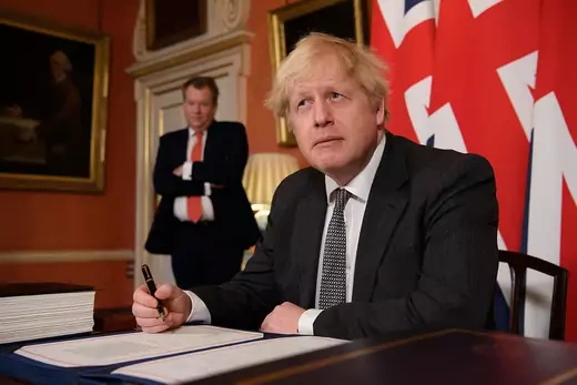Britain's Prime Minister Boris Johnson poses for a picture after signing the Brexit trade deal with the EU at number 10 Downing Street in London, Britain December 30, 2020.