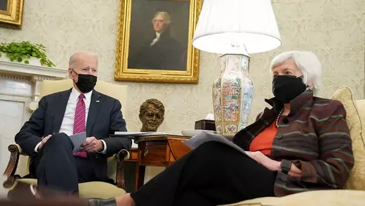 U.S. President Joe Biden meets with Treasury Secretary Janet Yellen sitting in the Oval Office.