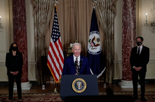 U.S. President Joe Biden delivers a foreign policy address as Vice President Kamala Harris and Secretary of State Antony Blinken listen during a visit to the State Department.