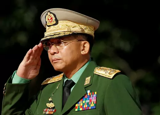 Myanmar Commander in Chief Senior General Min Aung Hlaing salutes as he attends an event marking the anniversary of Martyrs' Day at the Martyrs' Mausoleum in Yangon on July 19, 2016.