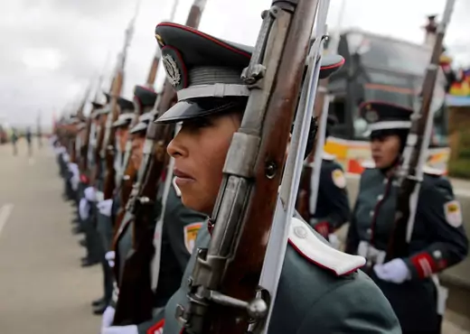 Women in the Bolivian military line up for maritime flag day celebrations on March 10, 2018. 
