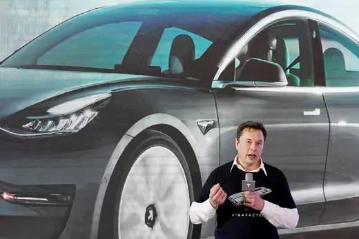 Tesla Inc CEO Elon Musk speaks onstage during a delivery event for Tesla China-made Model 3 cars.