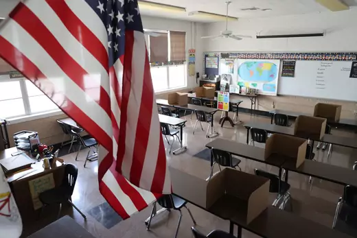 Social distancing dividers for students are seen in a classroom at St. Benedict School, amid the outbreak of the coronavirus disease (COVID-19), in Montebello, near Los Angeles, California