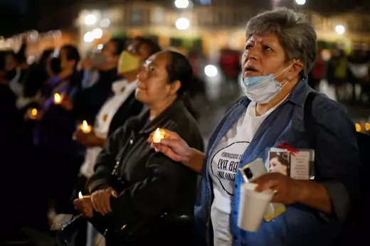 Women in Mexico City host vigil to protest government's inaction on femicide. 