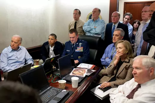 U.S. President Barack Obama (2nd L) and Vice President Joe Biden (L), along with members of the national security team, receive an update on the mission against Osama bin Laden in the Situation Room 