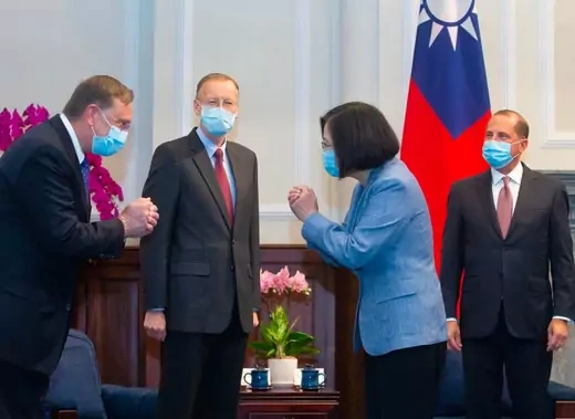 Taiwan's President Tsai Ing-wen (2nd R) gestures to a US official (L) as US Secretary of Health and Human Services Alex Azar (R) and director of the American of Institute in Taiwan, Brent Christensen (2nd L), look on during their visit to the Presidential Office in Taipei on August 10, 2020.