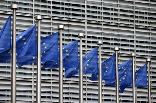 European Union flags flutter outside the EU Commission headquarters in Brussels, Belgium, in this file picture taken October 28, 2015. REUTERS/Francois Lenoir/File Photo