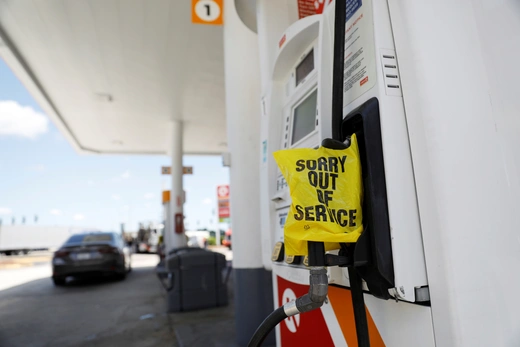 A plastic bag covering a fuel pump to signal no gas is available is seen at a Circle K gas station after a cyberattack crippled the biggest fuel pipeline in the country, run by Colonial Pipeline, in Lakeland, Florida, U.S. May 14, 2021.