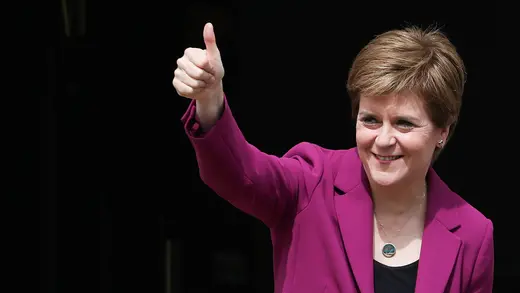 Scottish First Minister Nicola Sturgeon gives a thumbs up to supporters.