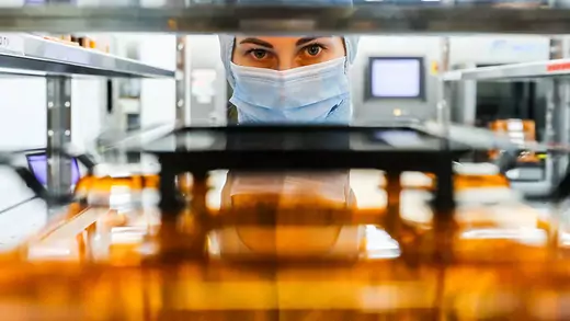 A worker in the photolithography section on a semiconductor plant of the Mikron Group in Zelenograd, Moscow