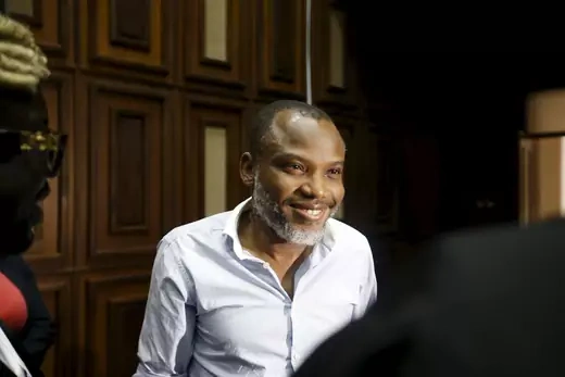 A picture of Nnamdi Kanu smiling.