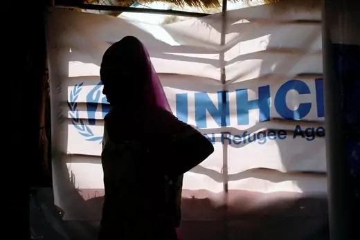 An Ethiopian refugee stands as she is registered by the United Nations High Commissioner for Refugees (UNHCR) at the Um Rakuba refugee camp which houses Ethiopian refugees fleeing the fighting in the Tigray region, on the Sudan-Ethiopia border, Sudan, November 28, 2020.