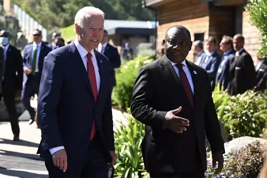 U.S. President Joe Biden talks with South Africa's President Cyril Ramaphosa as they arrive for a working session during G7 summit in Carbis Bay, Cornwall, Britain, June 12, 2021.