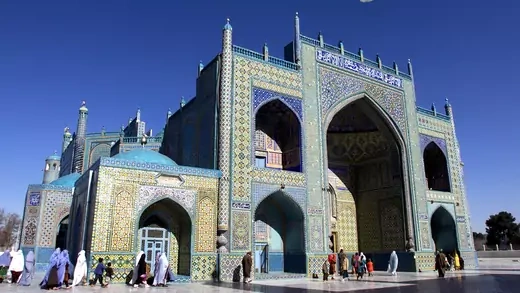 Afghan Muslims flock to the Blue Mosque, also known as the Tomb of Ali.