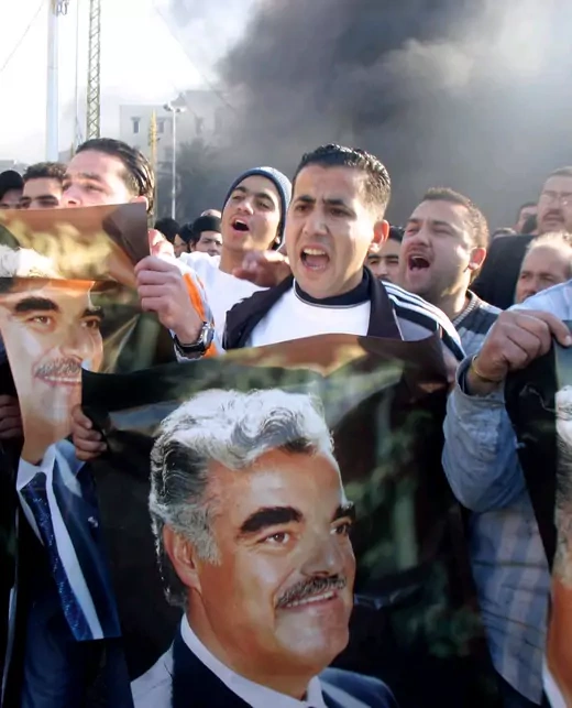 Lebanese supporting former PM Rafik al-Hariri take part in a protests over Hariri's killing.