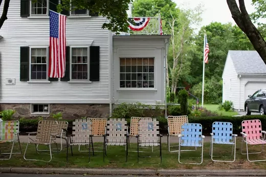 Chairs line the side of the road ahead of the 236th annual Military, Civic, and Firemen's Parade as part of 4th of July celebrations in Bristol, Rhode Island, U.S.
