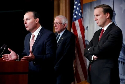 Senators Mike Lee (R-UT), Bernie Sanders (I-VT) and Chris Murphy (D-CT) speak after the senate voted on a resolution ending U.S. military support for the war in Yemen on Capitol Hill in Washington, U.S., December 13, 2018.