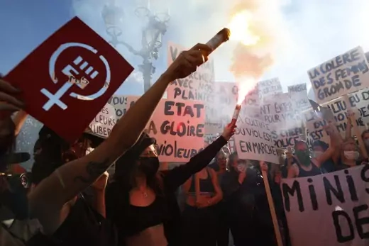 Protesters shout slogans during a demonstration called by feminist movements in front of the city hall in Paris, on July 10, 2020, to denounce the nomination of French Interior Minister, facing rape accusations and French Justice Minister who criticised the #MeToo movement against sexual harassment.