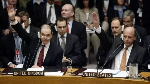 Ambassadors from the United States and the UK join the unanimous Security Council vote to give Saddam a final chance to disarm.