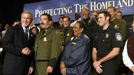 Bush greets U.S. Border Patrol officers at an event promoting the Department of Homeland Security.