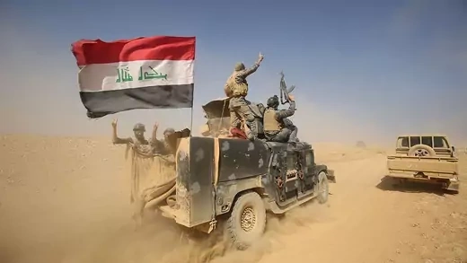 Iraqi forces, backed by the United States in part under the authority of the 2002 AUMF, assist in the fight against the Islamic State near Mosul in October 2016.