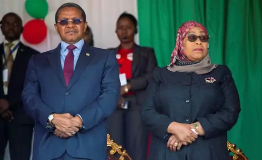 Tanzanian President Samia Suluhu Hassan and former President Jakaya Kikwete stand side-by-side.