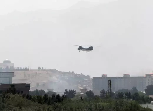 A U.S. Army helicopter is seen flying over Kabul