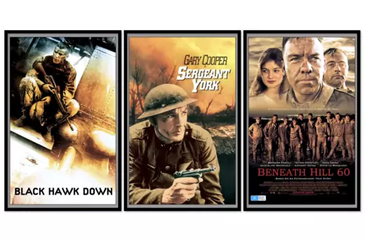 Three movie posters: "Black Hawk Down" (man sits with a gun); "Gary Cooper Sergeant York" (man in helmet crouches with a gun); "Beneath Hill 60" (a woman and two men look out above the photo of a group of men in mining gear).
