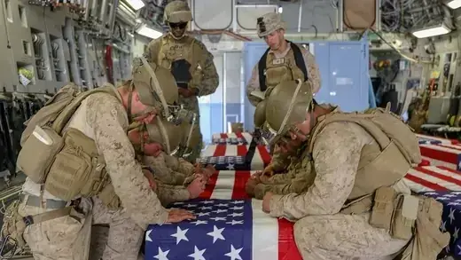 U.S. marines honor the service members killed outside of Hamid Karzai International Airport. 